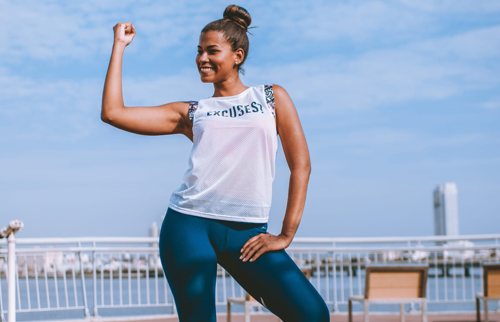 Proud woman with fist in the air blog1@2x